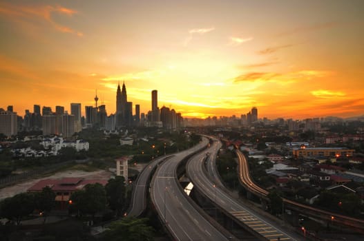 The capital of Malaysia, Kuala Lumpur city skyline in beautiful sunset view.