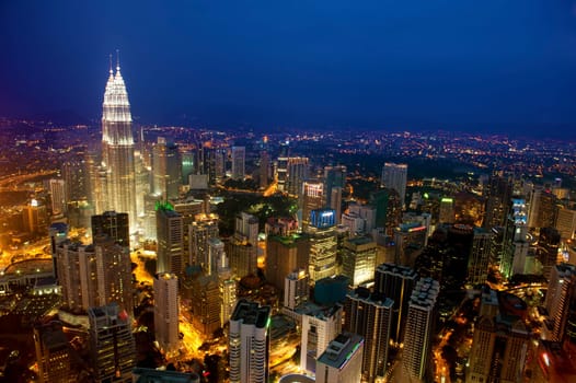 Sunset Aerial View with blue sky of Kuala Lumpur skyline, capital city Malaysia.
