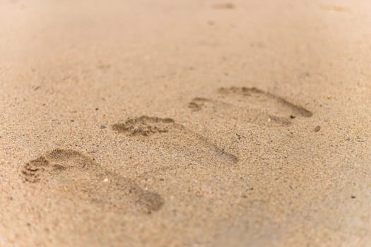 Closeup of sand pattern of a beach in the summer