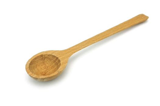 Wooden spoon,close-up of kitchen appliance on white background