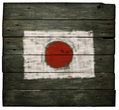 Japanese flag on weathered board wall