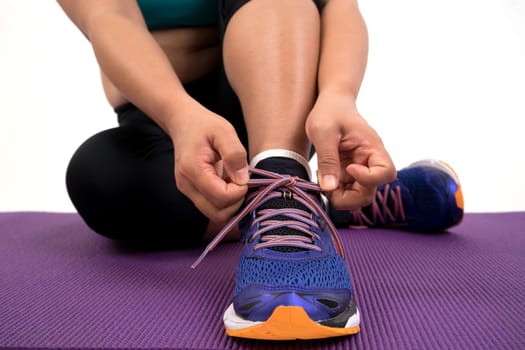 chubby woman doing fitness on white background