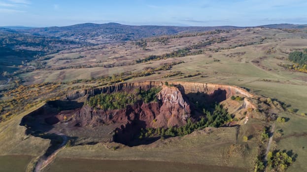 volcanic crater in Racos village. Brasov county, Transylvania, Romania. Aerial view