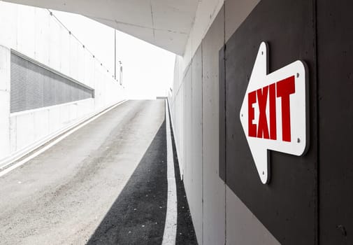 Underground parking garage exit with arrow signal