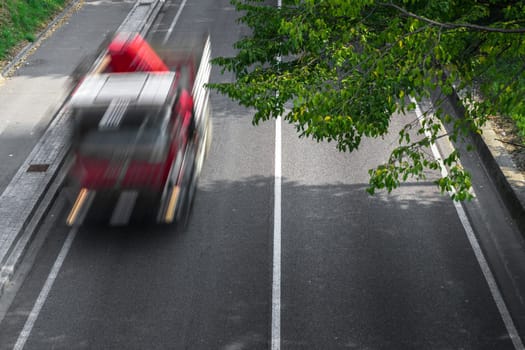 Motion blur of cars in aerial view over the road. (Speed limits - Infractions - Speed Cameras)