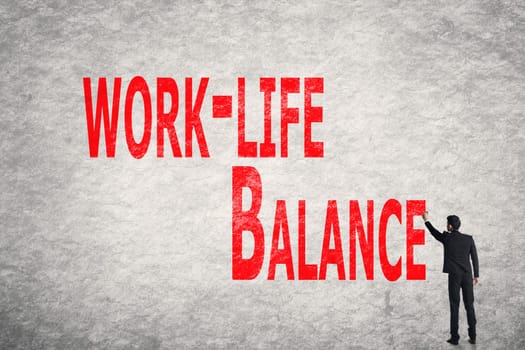 Asian business man write words on wall, Work-Life Balance