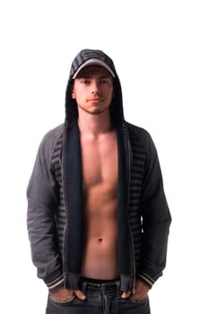 Beautiful young man in hoodie jacket open on naked chest, posing isolated on white