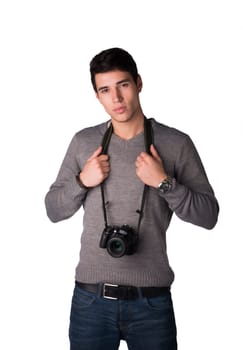 Handsome young man with professional photo camera hanging from his neck, isolated on white