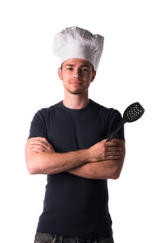 Half Body Portrait of Young Male Chef Wearing Casual Black Shirt and White Hat with Black Ladle on Hand While Looking at the Camera. Isolated on White Background.