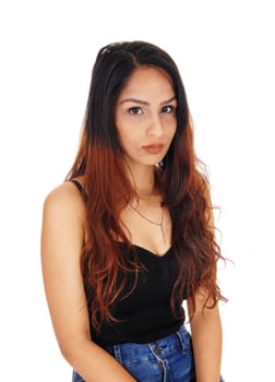 A closeup portrait image of a brunette woman in a black top, looking.serious with necklace, isolated for white background.