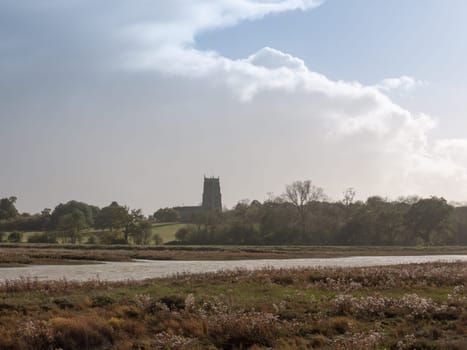 beautiful coast landscape scene with english church on horizon Alresford  essex  england  uk