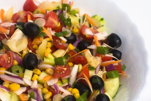 Rich seasonal salad from a lot of different vegetables.