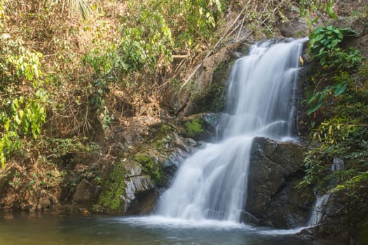 Thor Thip waterfall in thai national park.waterfall in the deep forest on mountain