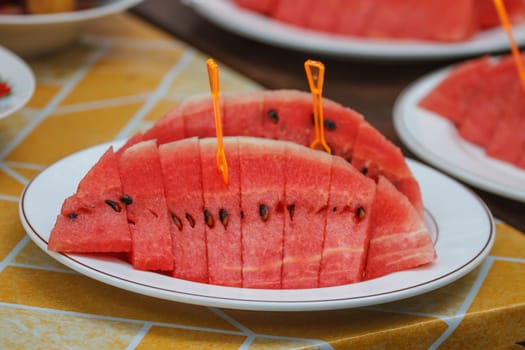 Colorful Thai fresh fruit on ceramic plate