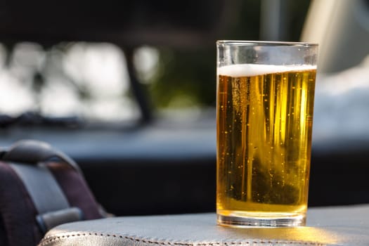 close up Glass of light beer on background
