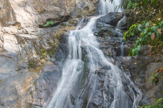 Thor Thip waterfall in thai national park.waterfall in the deep forest on mountain