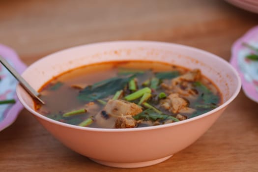 thai food and tom yum pork on table