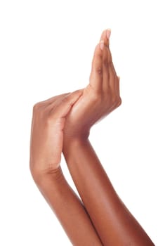 A closeup image of the elegant hands of an African woman over.white background.