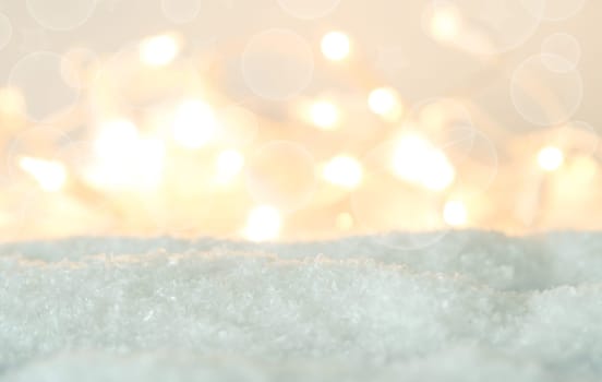 Snow background with blurred lights, winter or Christmas concept background