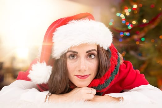 Happy and beautiful girl with freckles at home in Christmas
