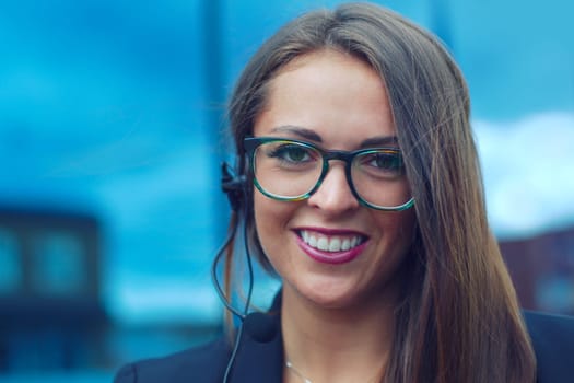 young woman representative talking in a phone microphone for customer support