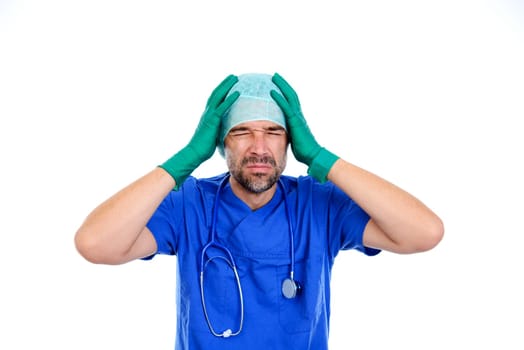 young doctor with headaches in front of white background