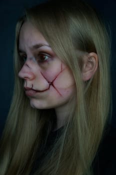 young blonde woman,sfx make up,make-up sore