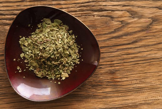 Cooking ingredients, herbs on a wooden rustic table
