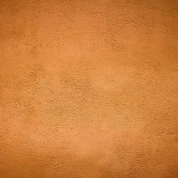 Abstract orange plaster wall texture. Background and texture.