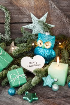 Froehliche decoration with candles for Christmas