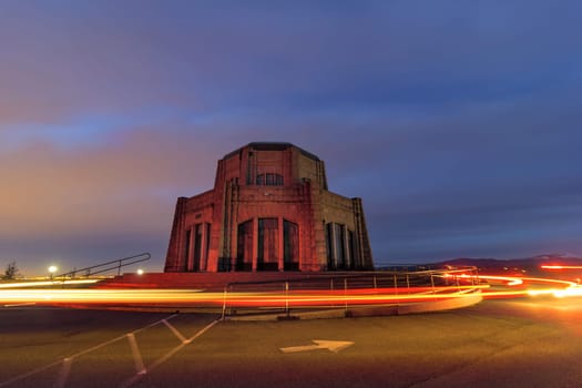 Light Trails of Cars going rround Vista House on Crown Point in Columbia River Gorge Oregon United States America
