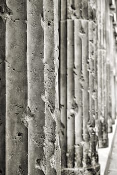 old damaged sandstone columns on a building in Berlin