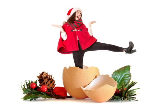 Happy and beautiful girl with freckles in Christmas, inside an egg shell