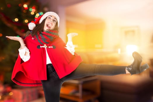 Happy and beautiful girl with freckles in Christmas, dancing