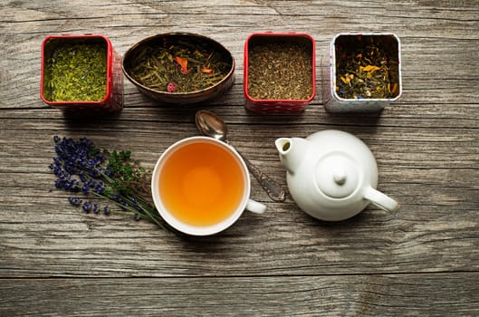 Cup of tea with dry tea collection of different types