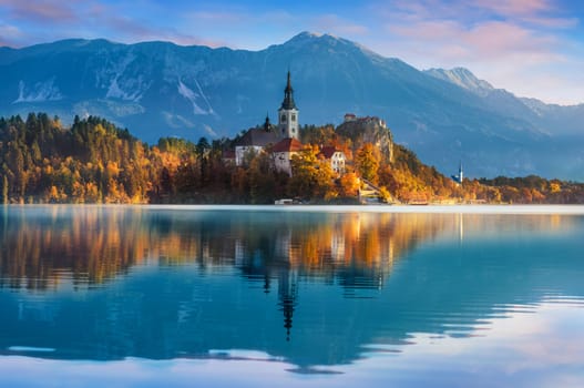 Amazing View in autumn  : Bled Lake, Island,Church And Castle With Mountain Range (Stol, Vrtaca, Begunjscica) In The Background-Bled,Slovenia,Europe