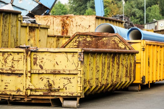 Used containers in a scrap yard