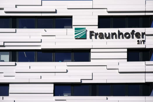 Darmstadt,Germany - October 31,2017: The logo of the Fraunhofer Institute of the Technical University of Darmstadt on the façade of a modern building on October 31,2017 in Darmstadt.