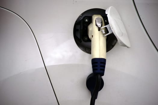 A filling station for cars with electric drive with an electric connection.