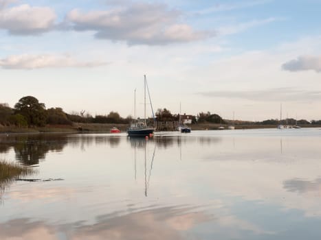 boats in harbour masts landscape river lake water surface clear  essex  england  uk