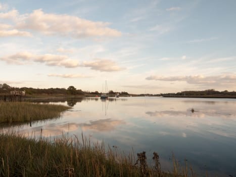 boats in harbour masts landscape river lake water surface clear  essex  england  uk