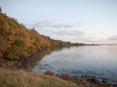 beautiful evening bay scene outside water wave ripples empty open space harbour country  essex  england  uk