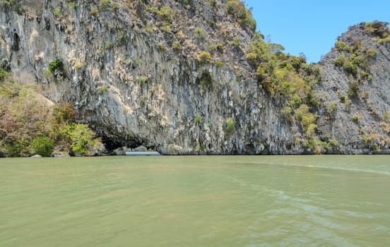 Sea cave of limestone island in Phang Nga Bay National Park, Thailand. The popular tourist destination for canoeing or kayaking