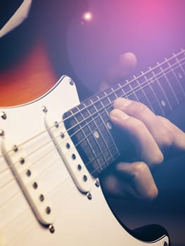 Detail of an electric guitar, guitar player or musician concept