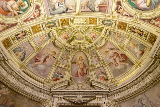 Vatican, Italy - October 31, 2015: a precious painted dome in the vatican building.
