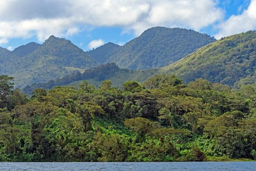 Verdant Volcanic Peaks in the Tropics by Lake Arenal in Costa Rica