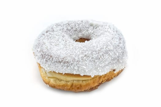 Donut with coconut crumble,close-up of sweets on a white background