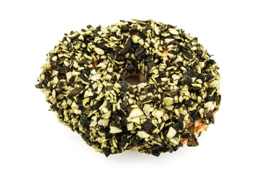 Donut with pumpkin seed,close-up of the dessert on a white background