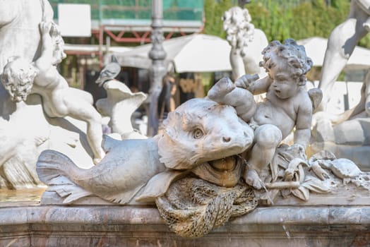 particular of the tritorn fountain in Navona square Rome