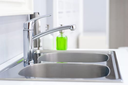 Interior of bathroom with sink basin faucet. Modern design of bathroom.